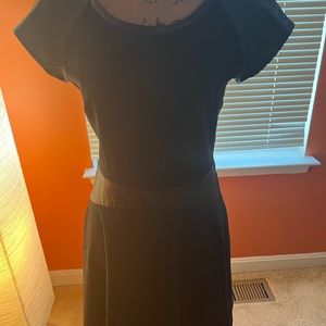 Black Dress with leather inserts.